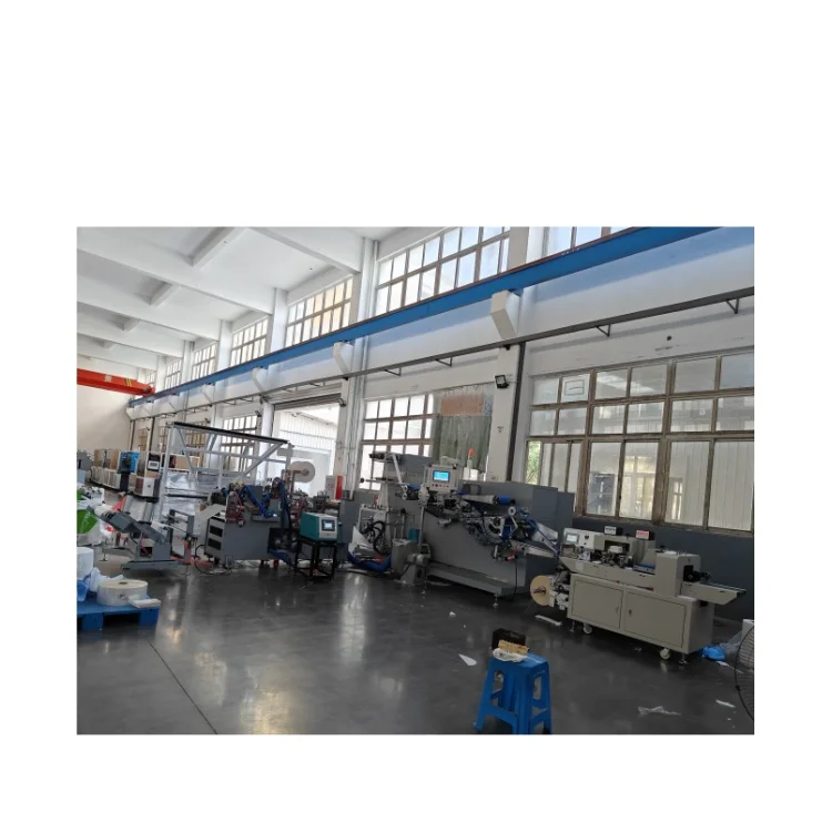 Disposable Non woven toilet seat cover making machine folding machine with easy peel off paper PE toilet cover packing machine