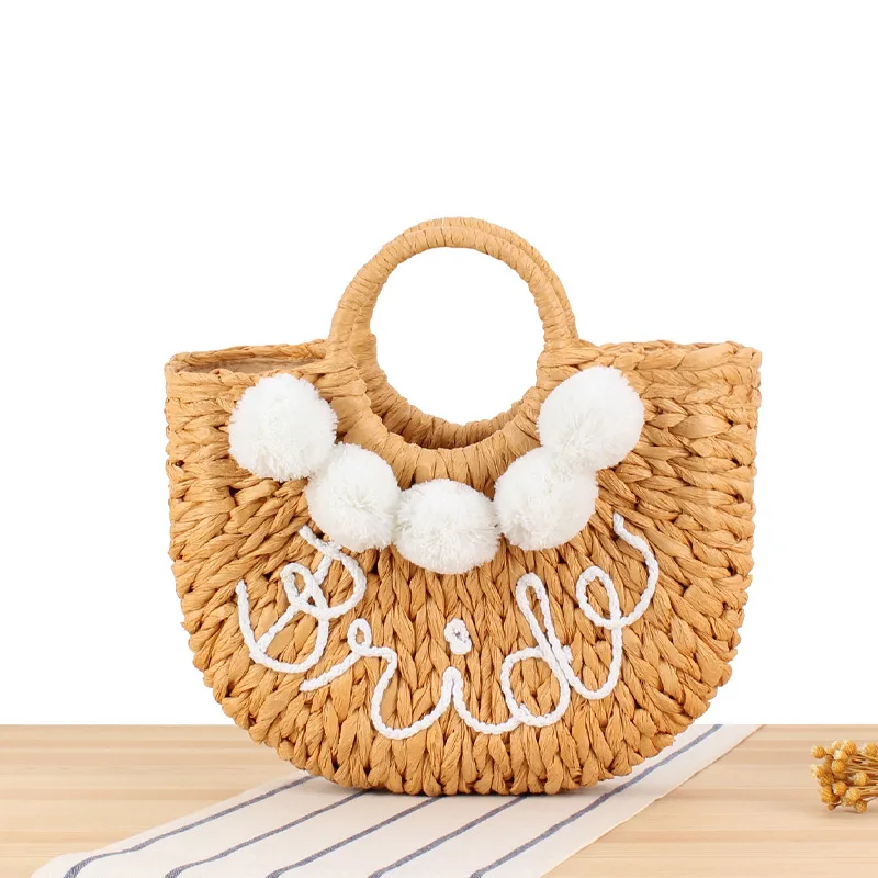 Factory Wholesale  Bride Straw Beach Hand Woven Large Purse Wedding Gift with Pompom Top Handle Summer Beach Rattan Tote Bag