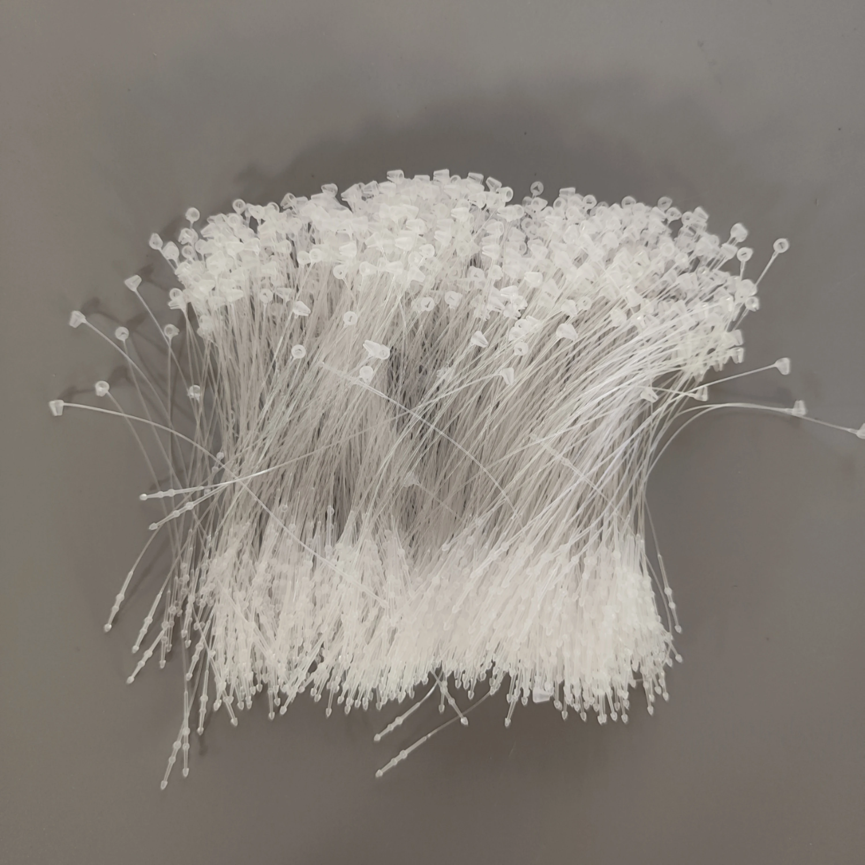 Booster OEM handcuff cable ties kabelbinder screw reel white black clips automatic hang tag string machine stringing threader