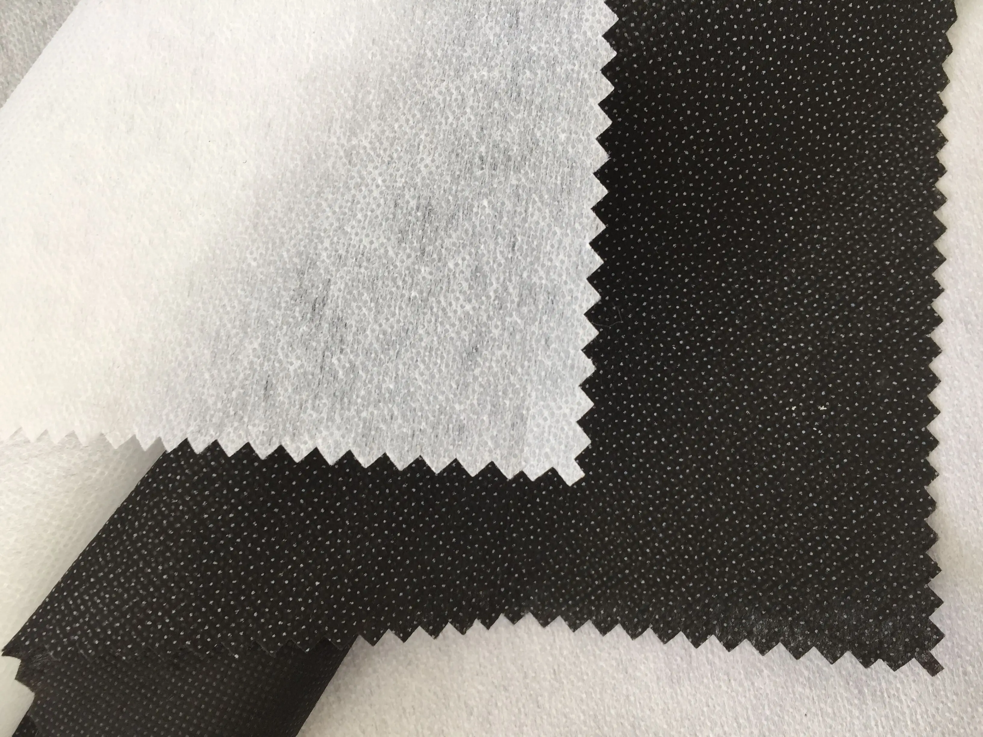 
100 Polyester reinforced stitch bond Interlining fusing brushed nonwoven buckram fabric 