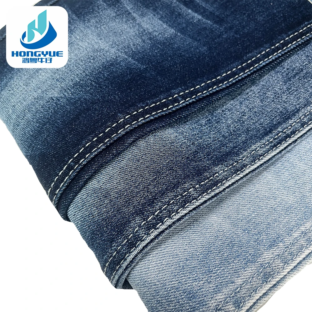 Wholesale Rolls Of 11.5oz Denim Fabric TC Yarn Raw Material 3/1 Twill For Jeans Indigo Rope Dyed Denim Fabrics