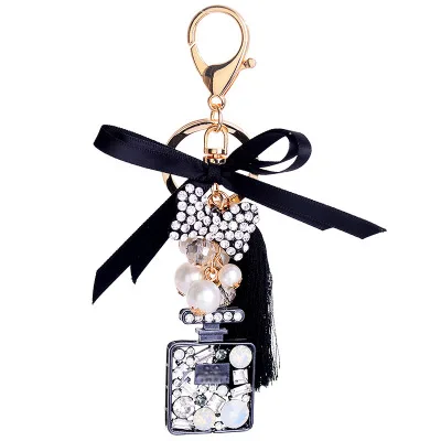 Factory supply butterfly icing silk tassel perfume bottle keychain girl bag car pendant