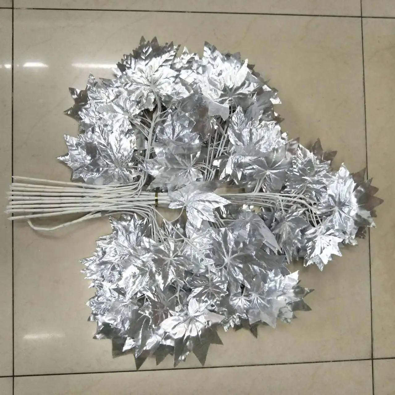 Silver artificial maple leaves for tree decoration