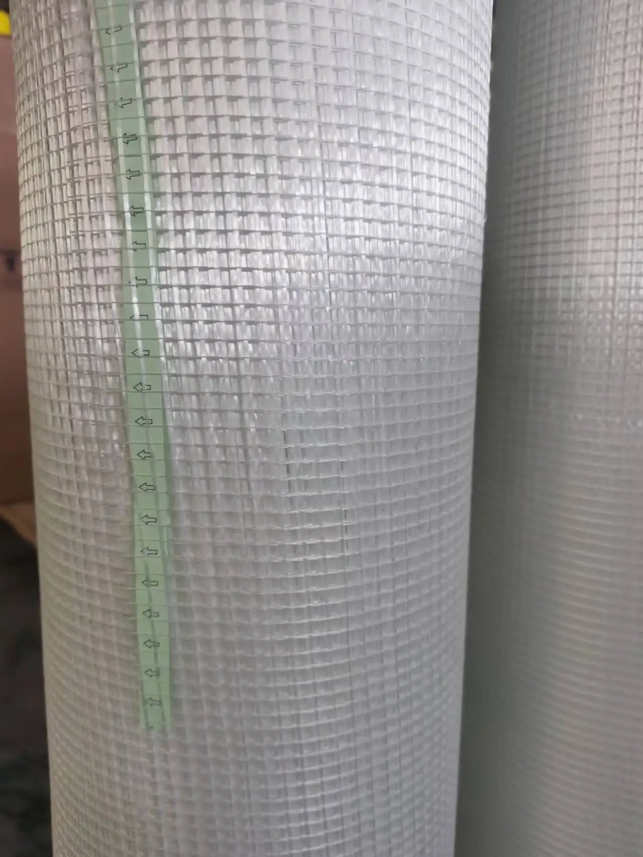 Self-adhesive fiberglass mesh for EPS