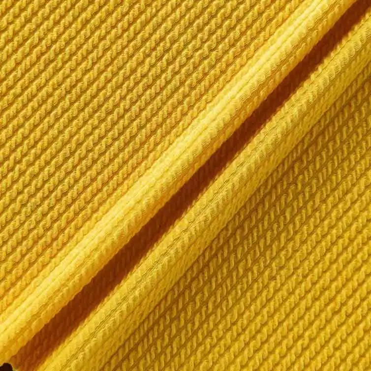 Изготовленная на заказ трикотажная жаккардовая стеганая ярко-желтая ткань в рубчик из 95% полиэстера, 5% спандекса для женской одежды
