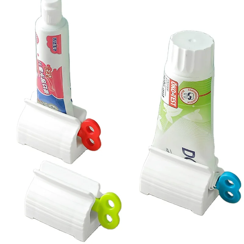 Hot Rolling Tube Toothpaste Squeezer Toothpaste Seat Holder Stand Rotate  Dispenser for Bathroom