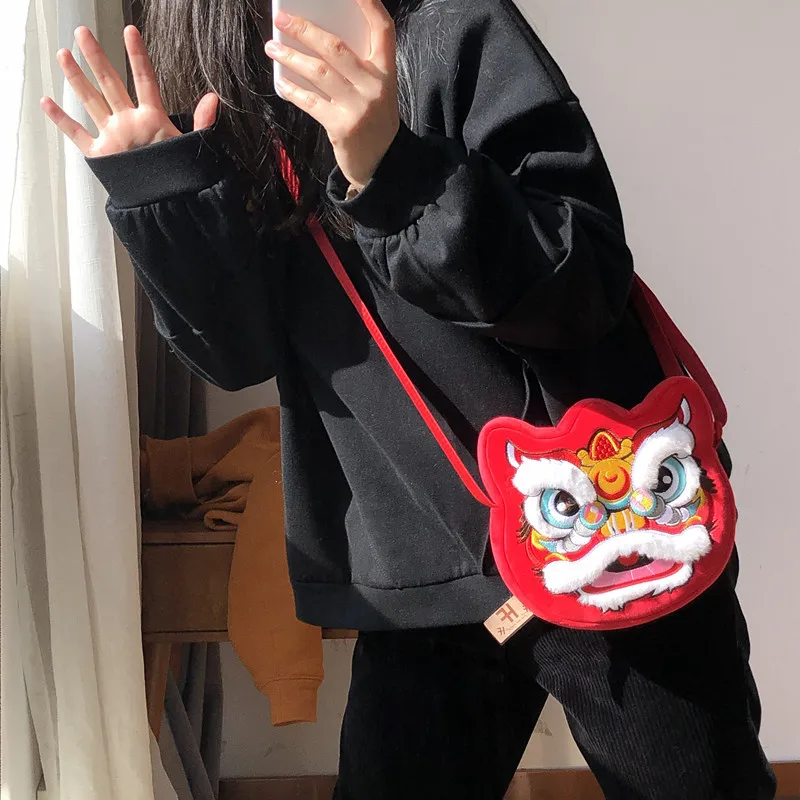 Cartoon Chinese lion dance plush animal shoulders school bag fashion cartoon pet kids plush backpack schoolbag for kids women