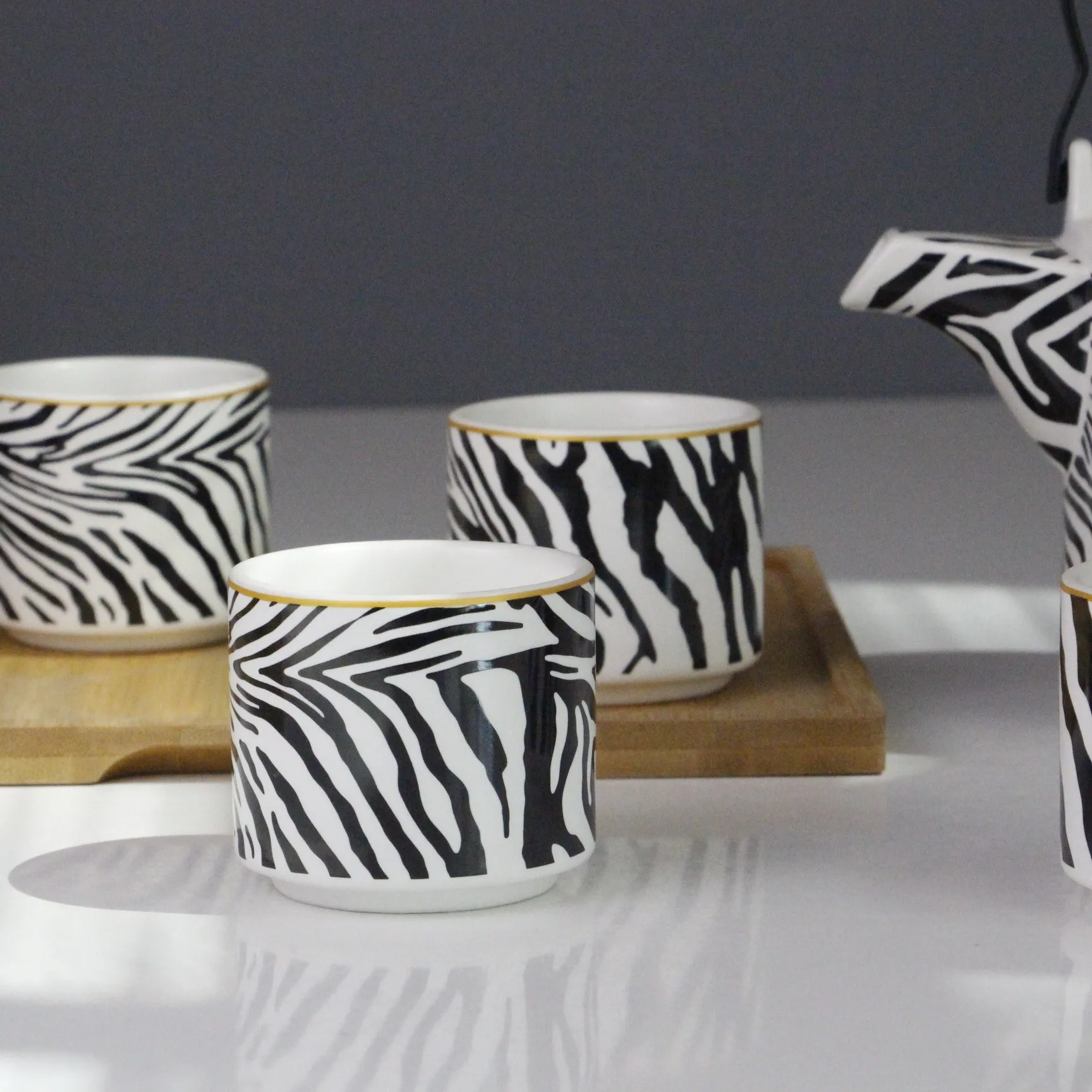 Ceramic tea set Tea pot with 4 tea cups Zebra decal pattern Bamboo wooden tray custom for daily use gift shop market