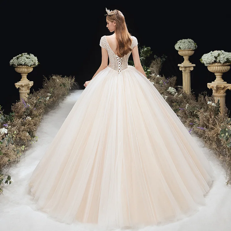 Luxury robe de mariage Simple Heavy Beaded Pearls Wedding Dress Half Sleeve Bridal Gowns