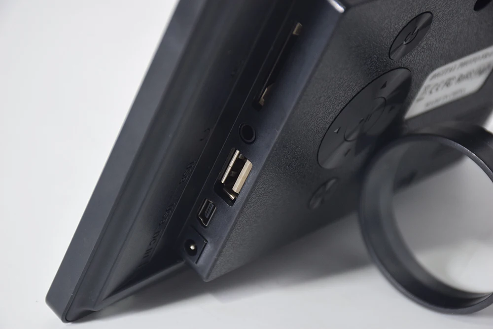 
Cheap touch screen photo frame loop video download picture songs 7 inch Android digital photo frame 