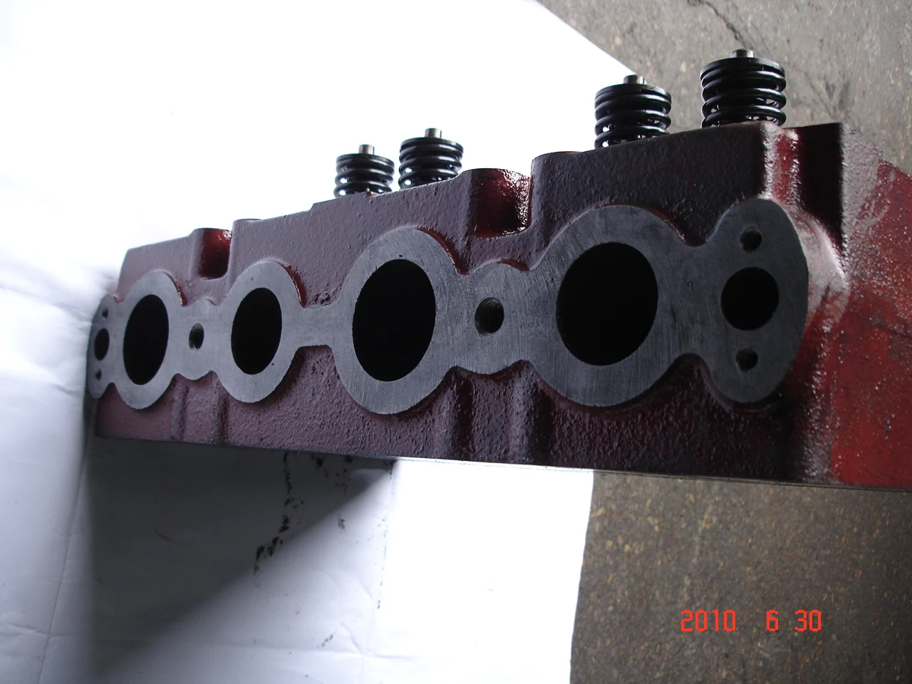 T-130 в сборе головки блока цилиндров