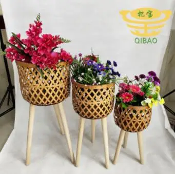 Wholesale fashion hand woven flowerpot PE rattan flowerpot with independent wooden leg outdoor flower basket