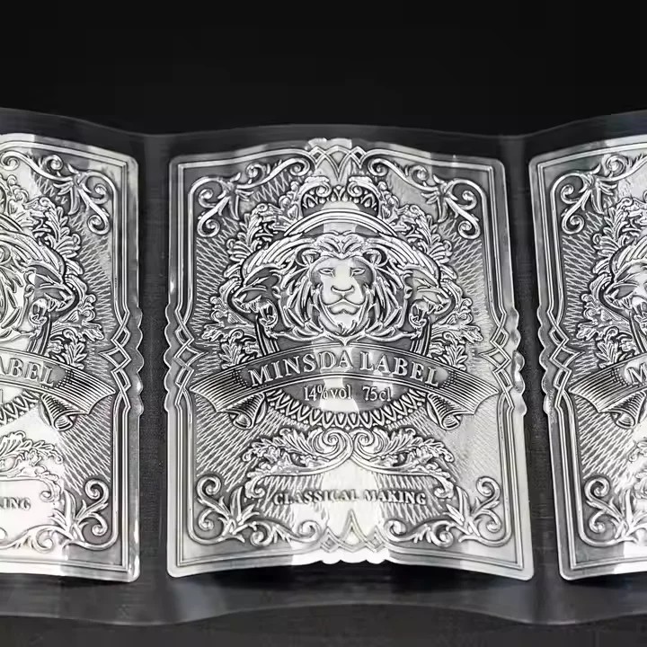 Custom Premium Silver-Embossed Glossy PVC, Metal, Aluminum, or PET Waterproof Logo Stickers for Wine Packaging Sheets.