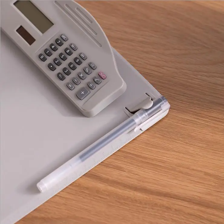 Plastic clipboard with calculator