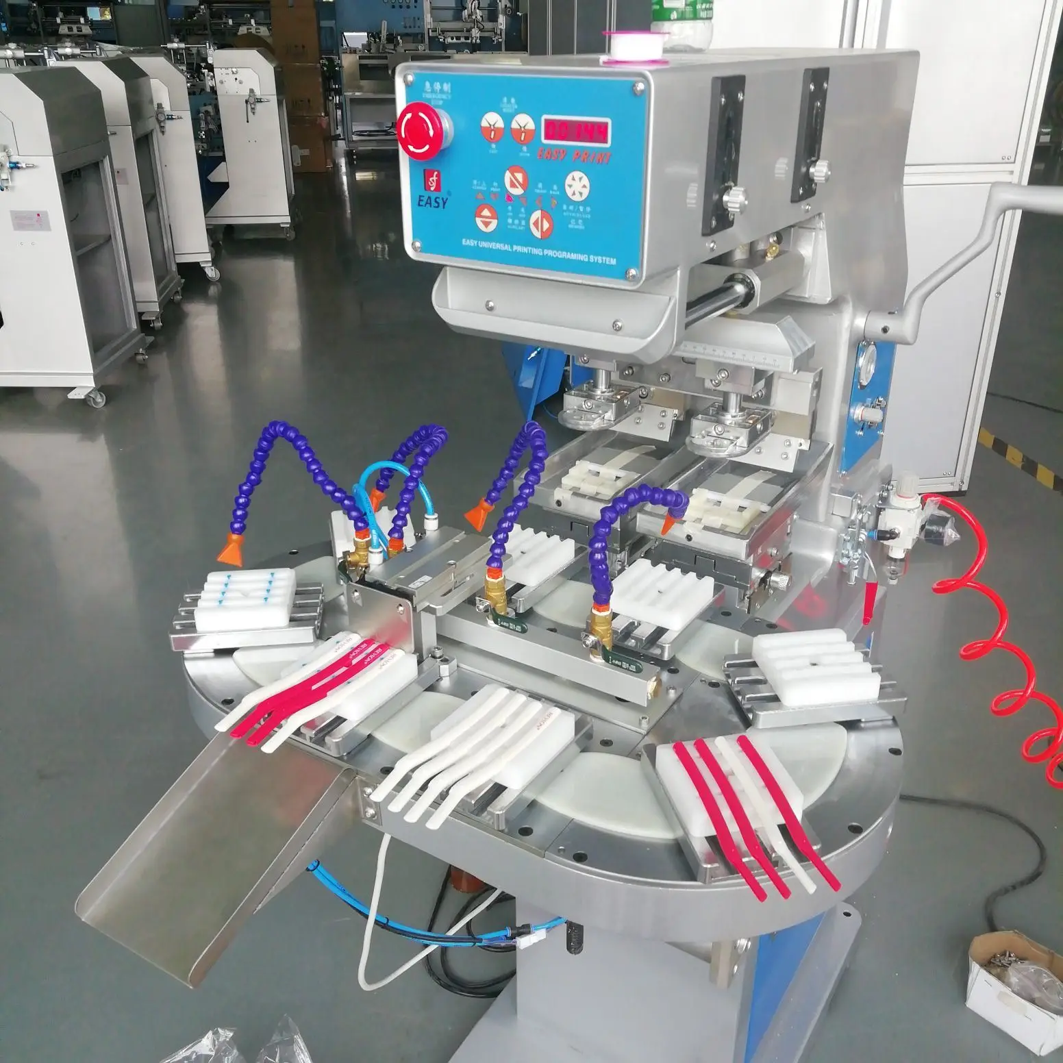 Two color pad printing machine with conveyor
