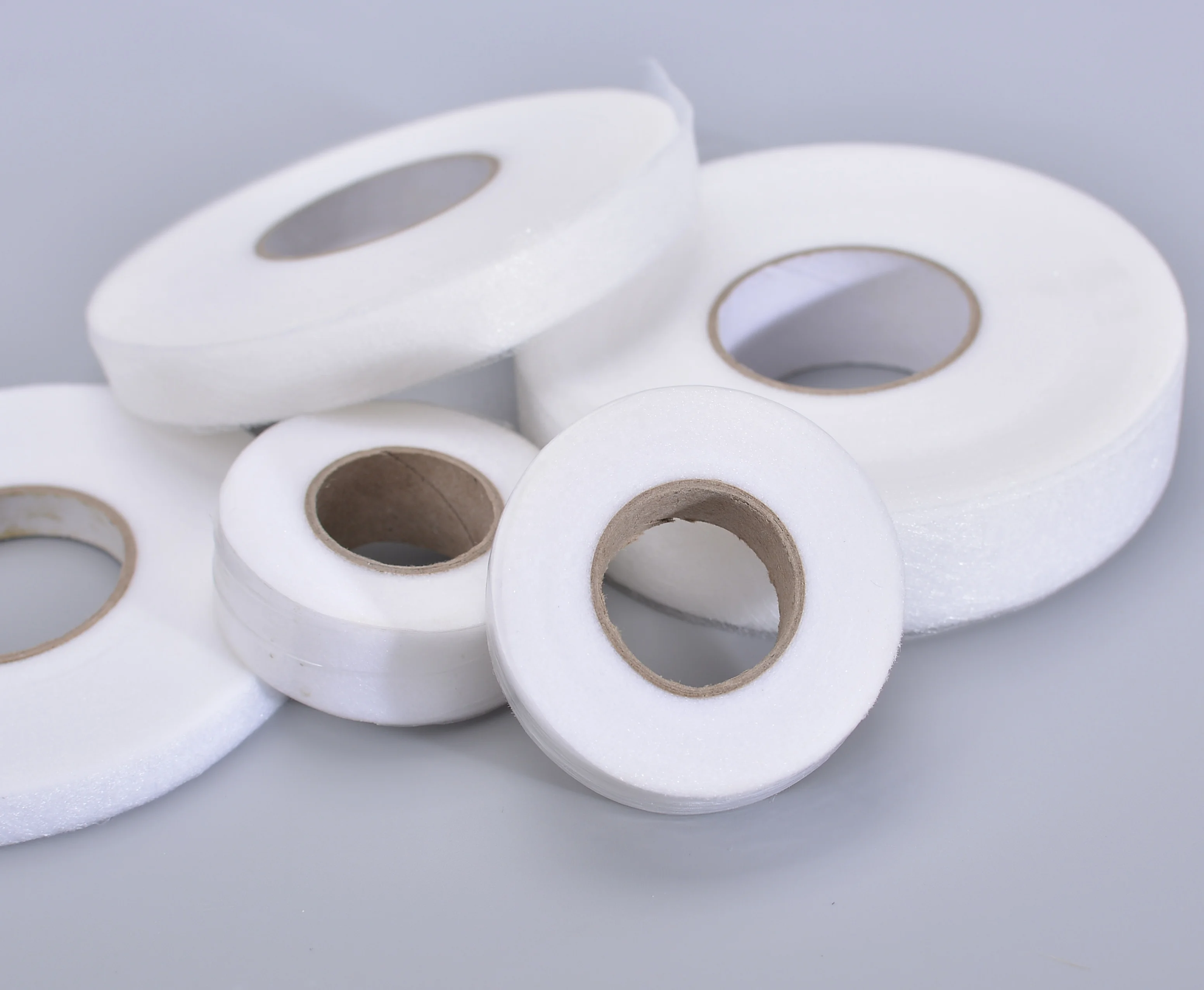 Double sided glue hot melt adhesive web with heat resistant adhesive tape for Textile