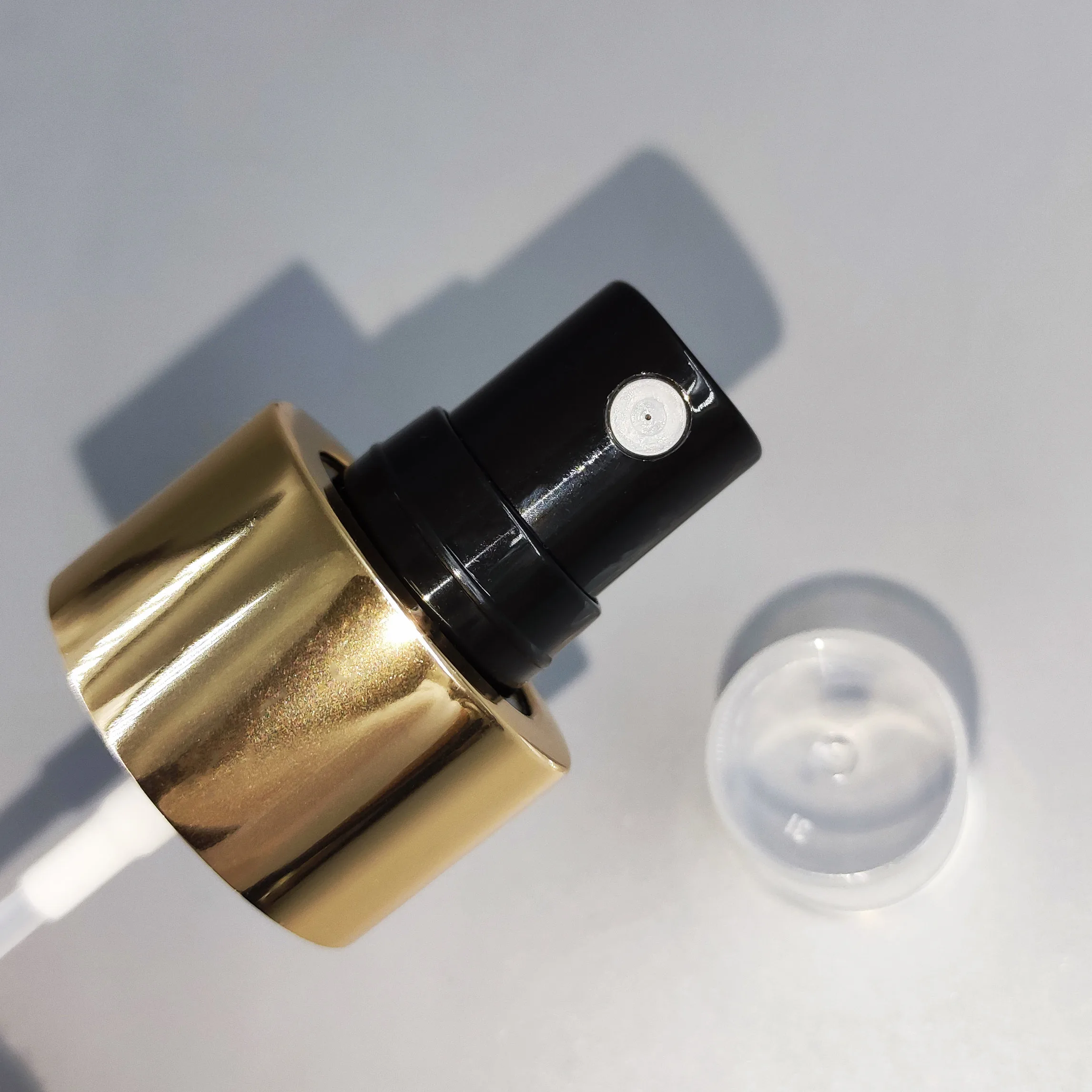 hot sell 24/410 gold color fine mist sprayer pump with clear cover aluminum spray caps fine mist spray pump spray