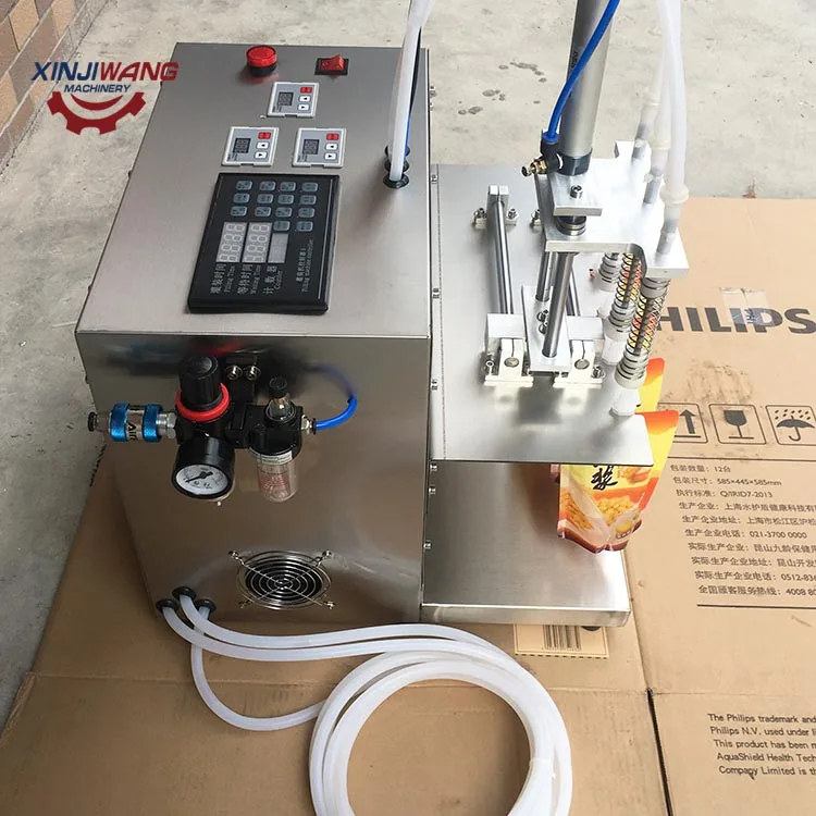 Semi automatic juice bag pouch sachet filing liquid packing machine with low cost