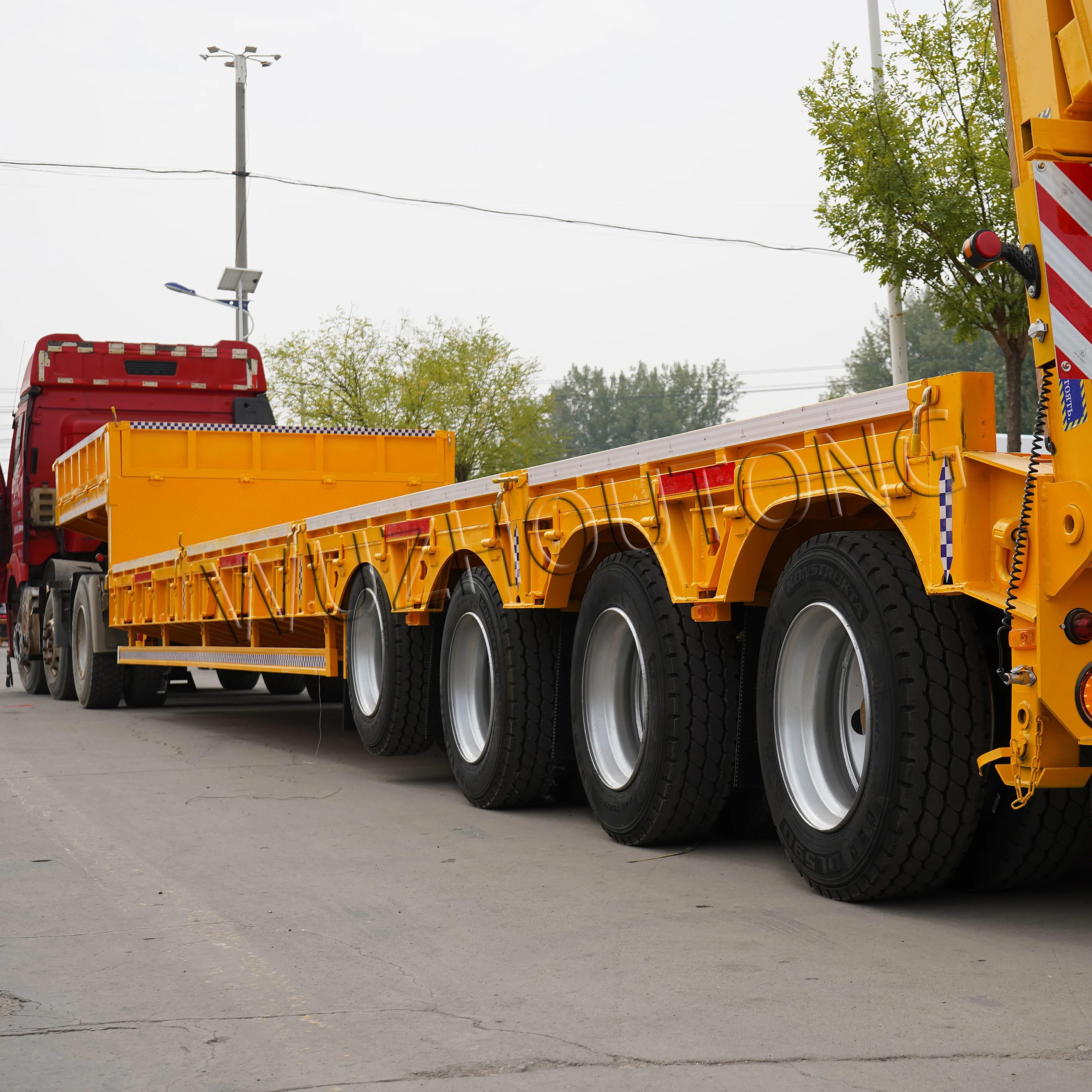 China 40ft 3 4 Axle Gooseneck Truck Car Carrier Transport lowbed Trailer Low Bed Semi Trailer for Sale