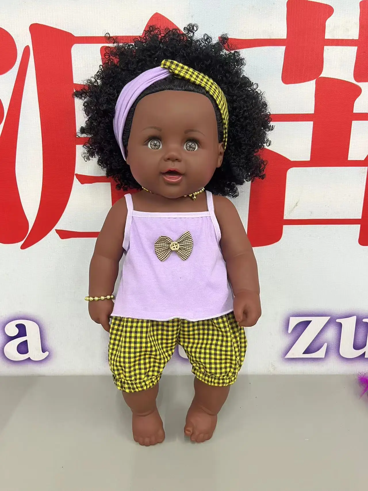 Wholesale 19inch 48cm vinyl african ponytail black baby doll new fashion dress manufacturer  in China