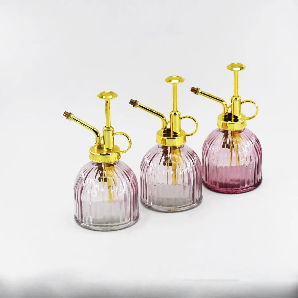 Wholesale High Quality Colored Transparent Ribbed Glass Watering Spray Bottle With Plastic Pump Lid