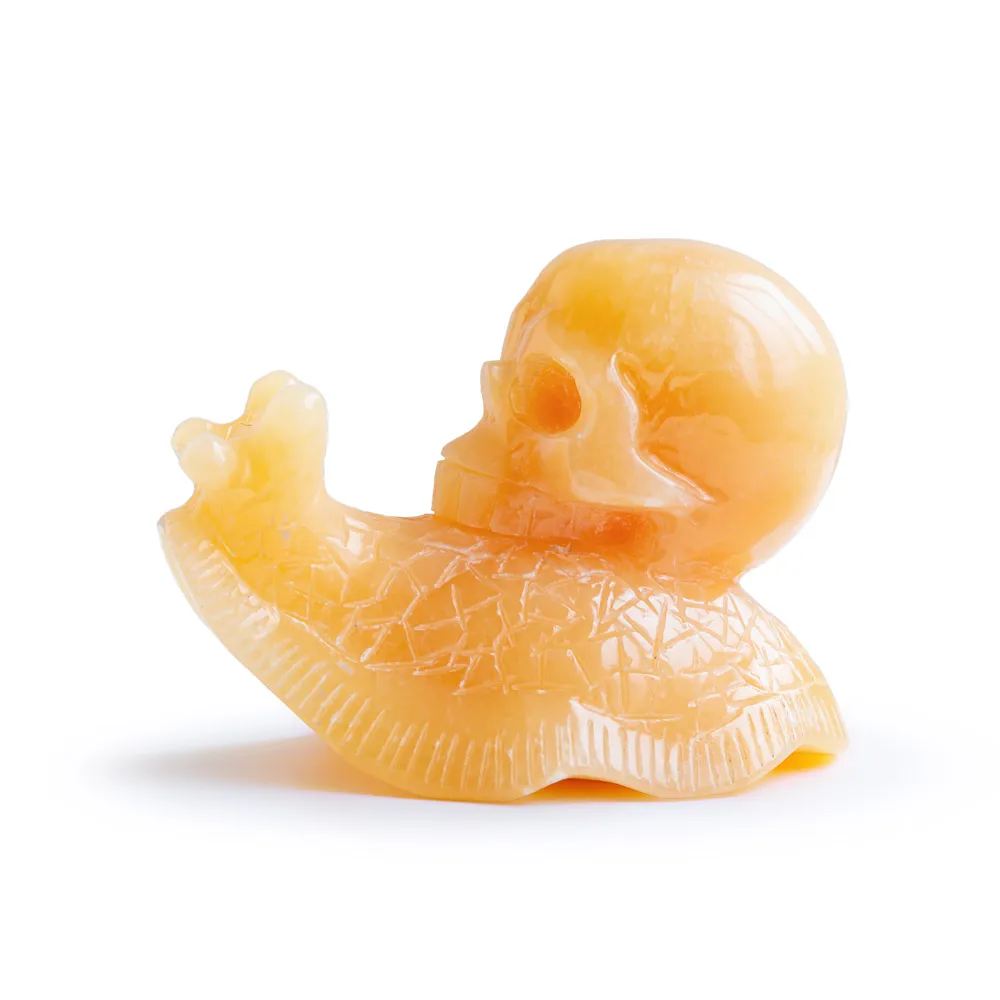 Wholesale hand carved natural healing stone pretty animal orange calcite crystal snail skulls folk crafts for home decoration