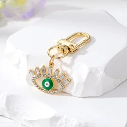 Cross-border e-commerce ornament hollow diamond eyelash eye keychain alloy geometric oil dripping Devil eye ornaments