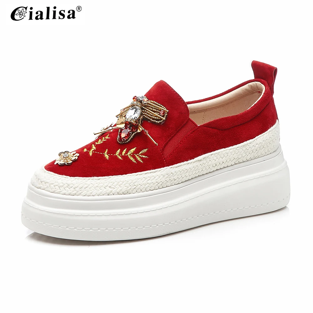 on a flat platform with rhinestones on laces; women's flat oxfords; casual shoes with rhinestones