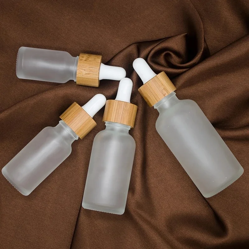 5pcs-lot-5ml-10ml-15ml-20ml-30ml-50ml-100ml-Bamboo-Cap-Essential-Oil-Frosted-Glass-Dropper.jpg_Q90.jpg_.webp (1).jpg