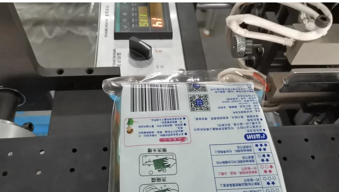 BenGang automatic OPP film bag forming Sponge scourer scrub dots Sparkle scrub sponge boat erasers scrubber packing machine