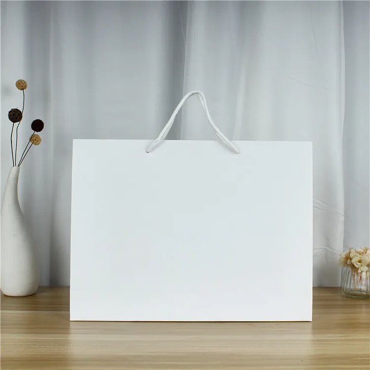 Custom high quality white big paper shopping bags with logo (1600379104321)