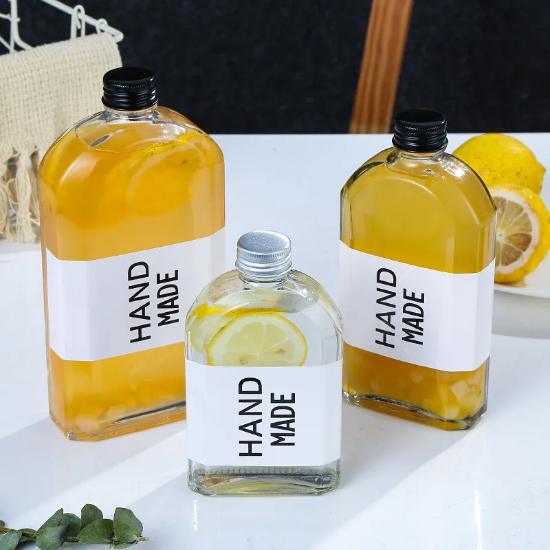 custom made empty flat shoulder 100ml 200ml 350ml 500ml flask ice cold brew glass coffee bottle with metal lid