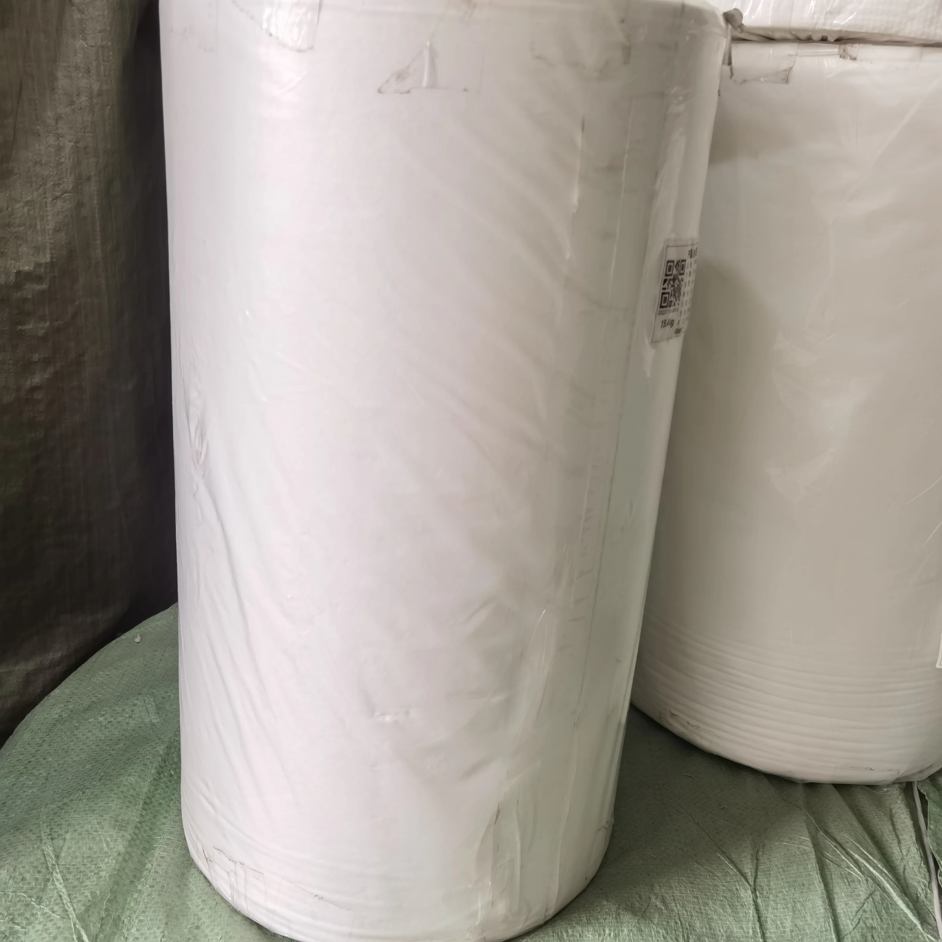 Spunlace Non Woven Wood Pulp PP  Parallel Cross Pearl Spunlace Nonwoven Fabric  for Washcloth Jumbo Rolls