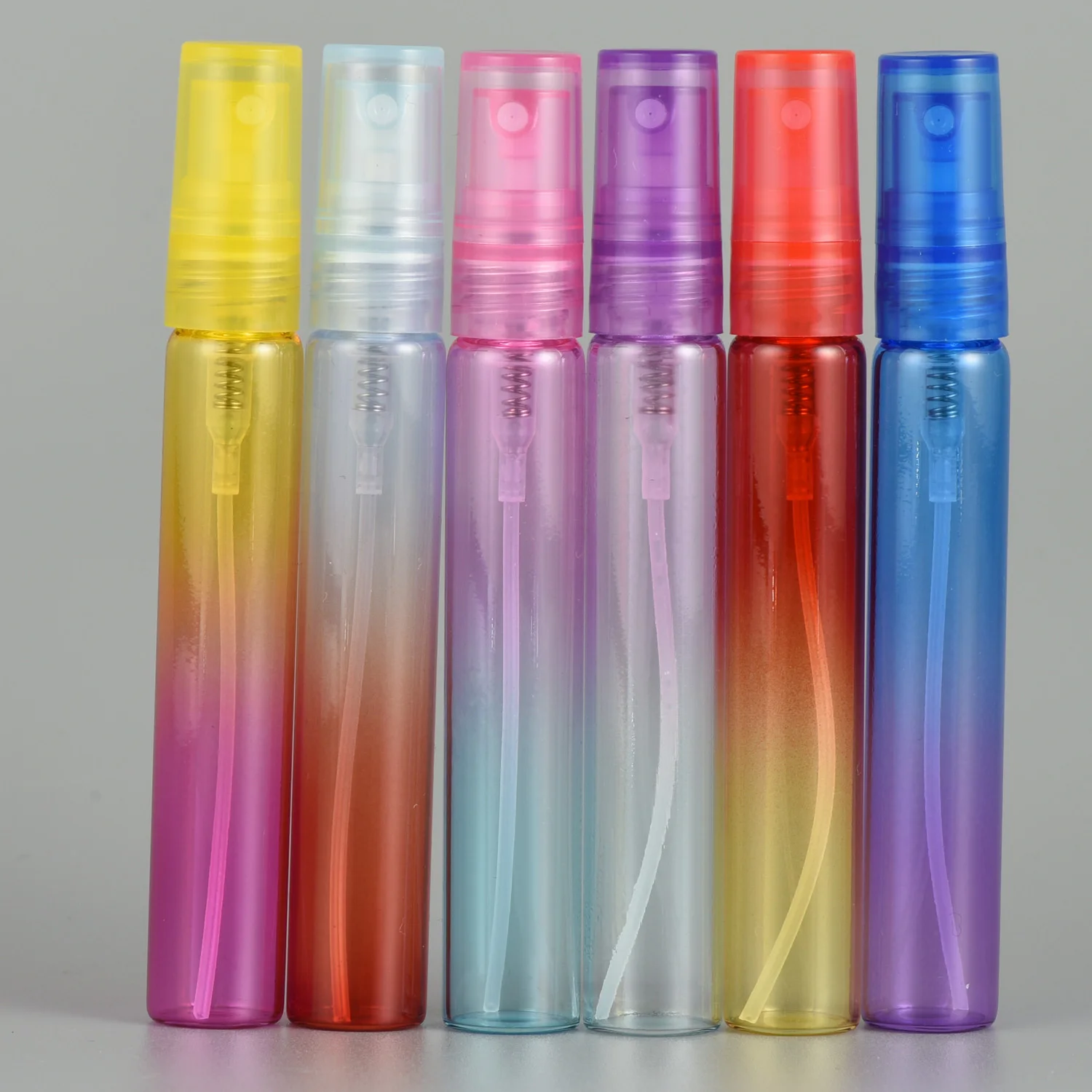 Low MOQ Sample Bottles Colorful Mist Spray Pump Empty Portable Mini 10ml 20ml Round Pen Pocket Perfume Bottle