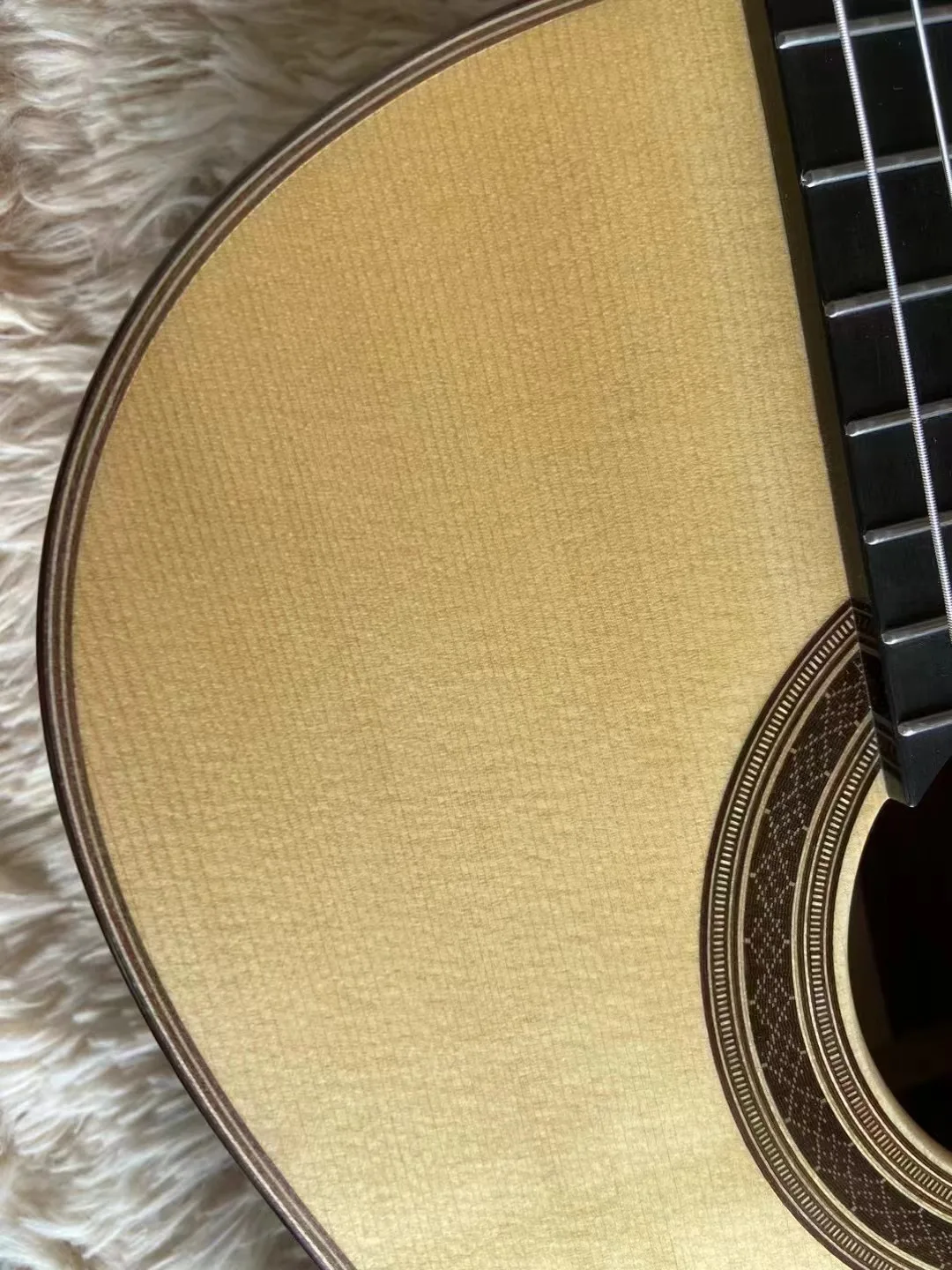 All-Solid Wood classical guitar with German spruce matched with the straight-grained figured Cocobolo of 2005