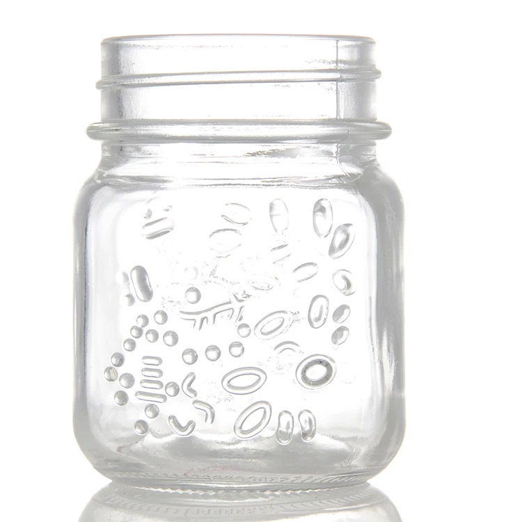 Manufacturer wholesale glass carved honey jar canned pickles canned peach embossed pattern to sample processing custom