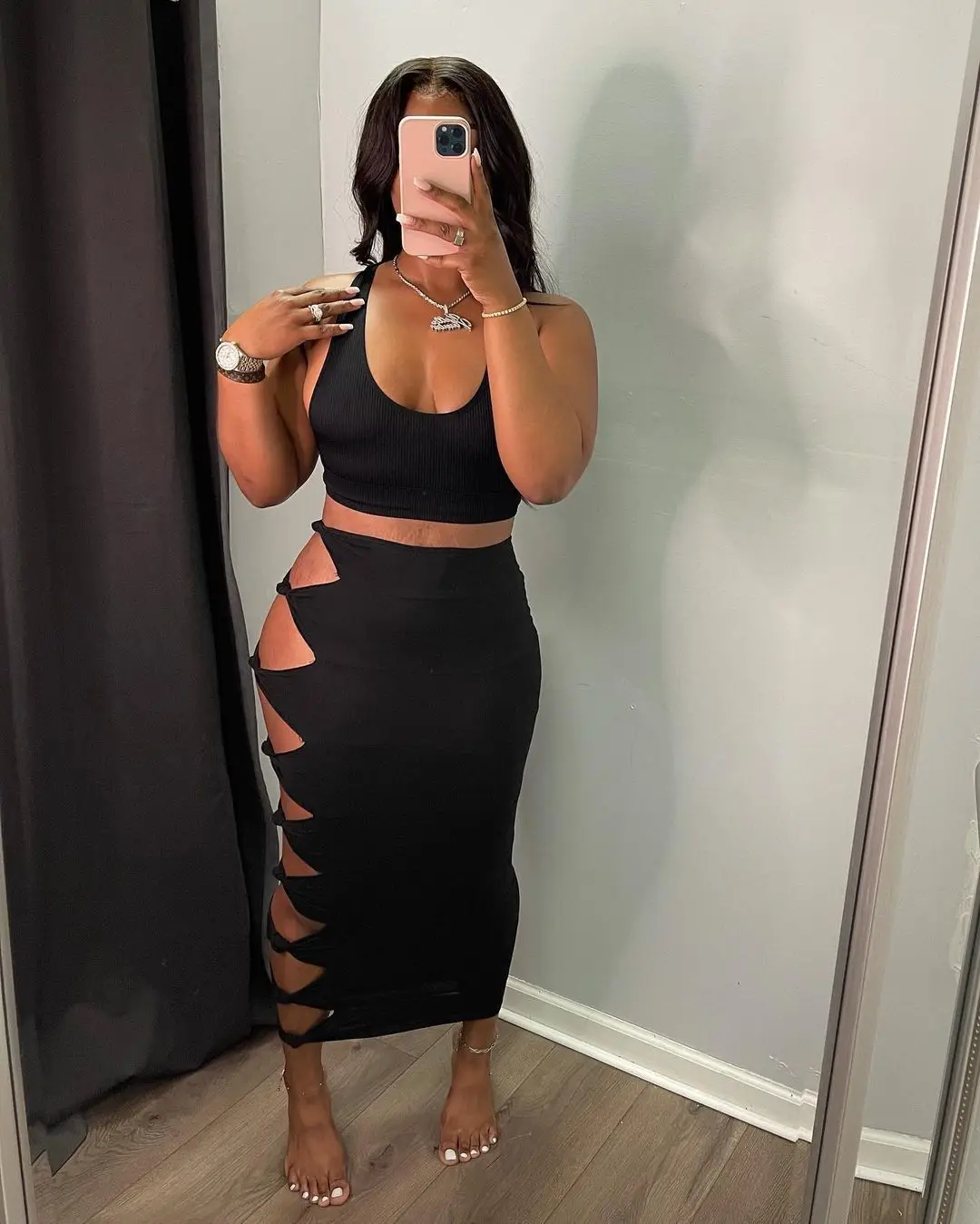 Street sexy solid color knotted and ripped stitching female long skirt