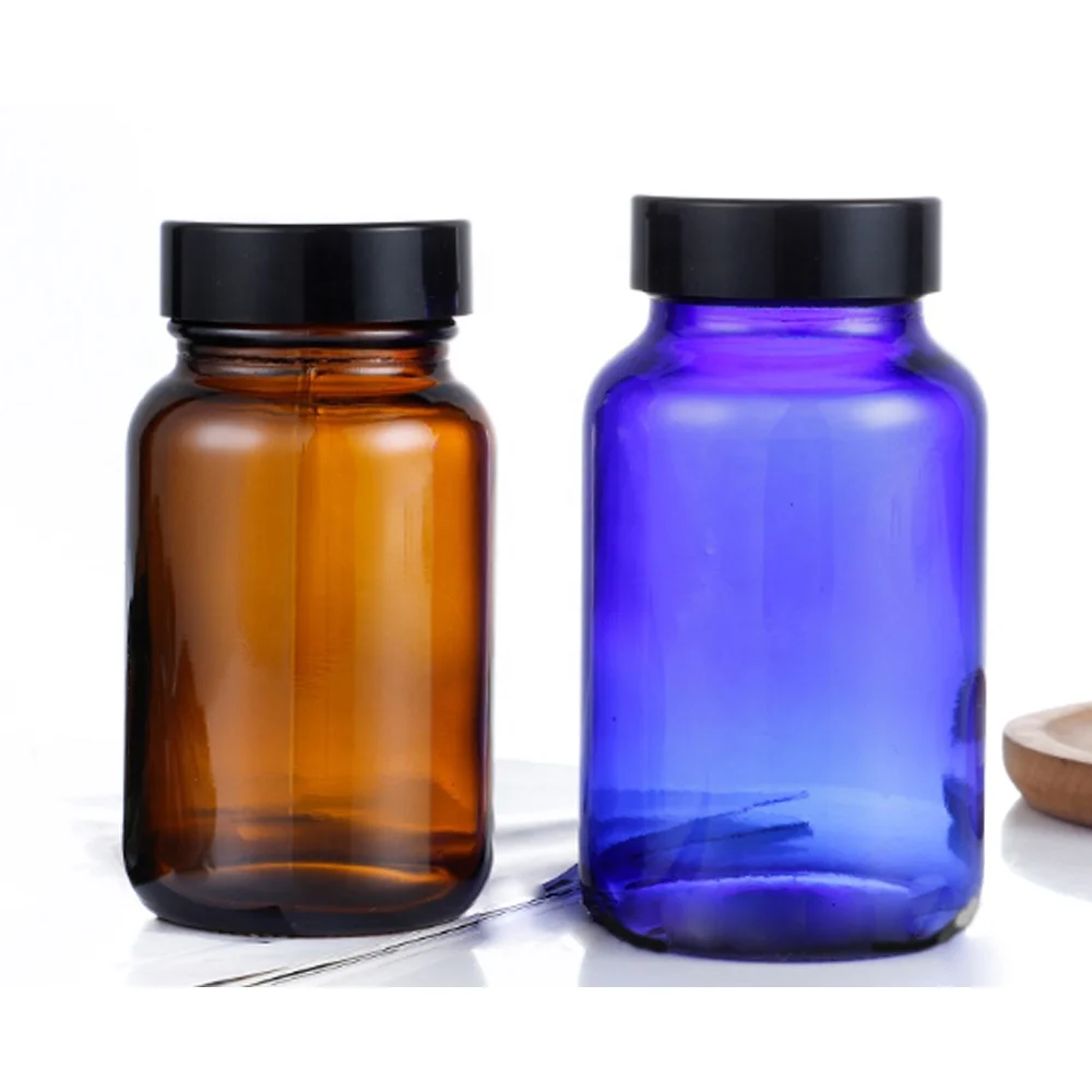 
high quality 2oz pharmaceutical glass bottles empty capsule bottle pills bottle with colorful cap 