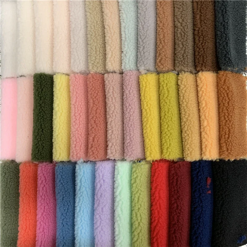 Free sample Hot sale 100% polyester red check jacquard wool rainbow color flannel fleece wholesale fabrics