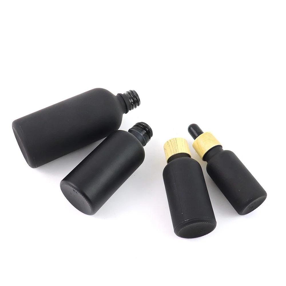Wholesale 5mL 10mL 15mL 20mL 30mL 50mL 100mL Matte Frosted Black Dropper Bottles With Bamboo Cap Calibrated Glass Pipette