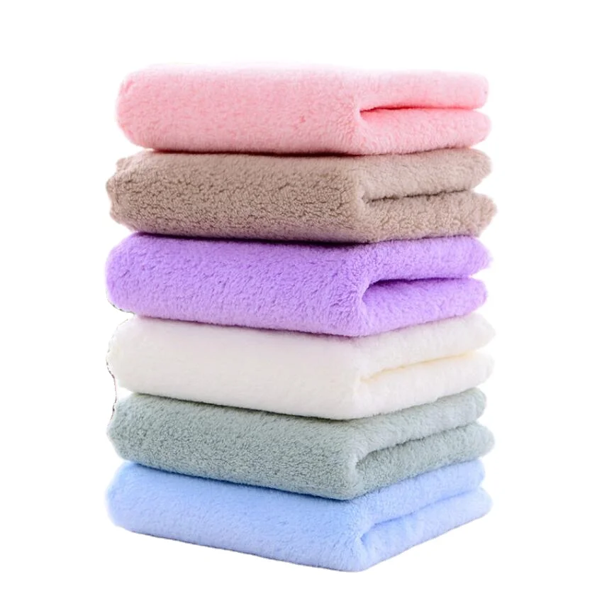 Chinese high quality 70*140cm 550gsm home towel set custom logo beach towel absorbent coral fleece microfiber bath towel