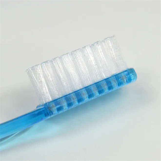 Custom logo blue disposable hotel travel plastic prepasted toothbrush set with liquid toothpaste