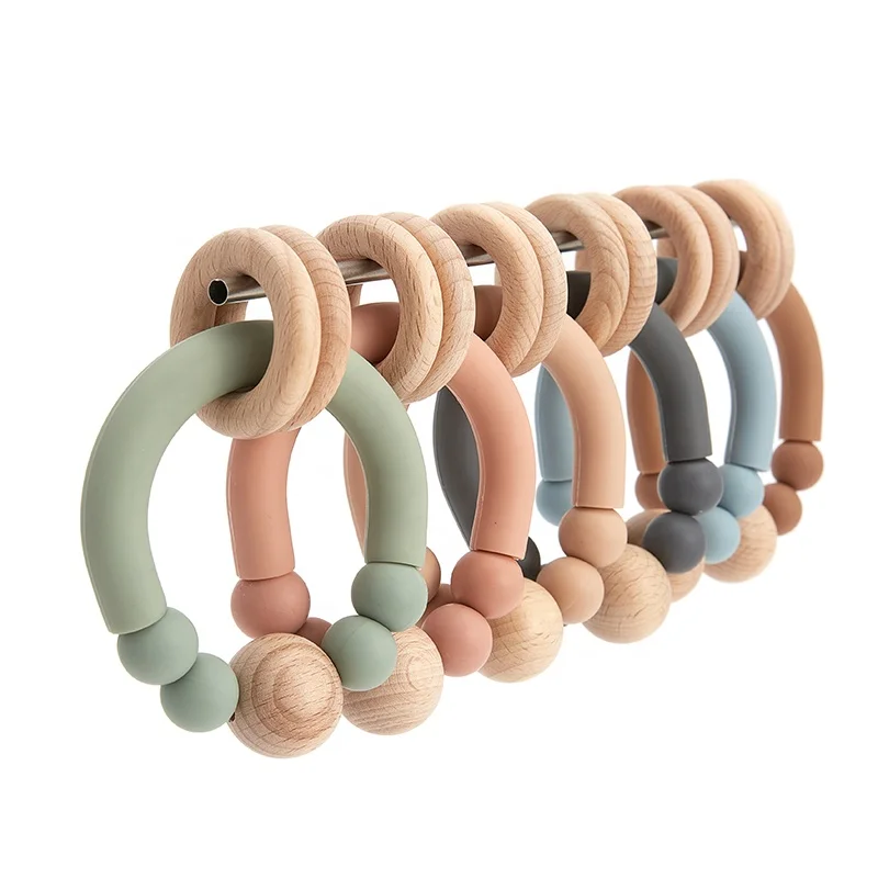 New Design Sensory Baby Teething Toys Rattle Soft Bpa Free Wood Baby Teether Ring Silicone Teether