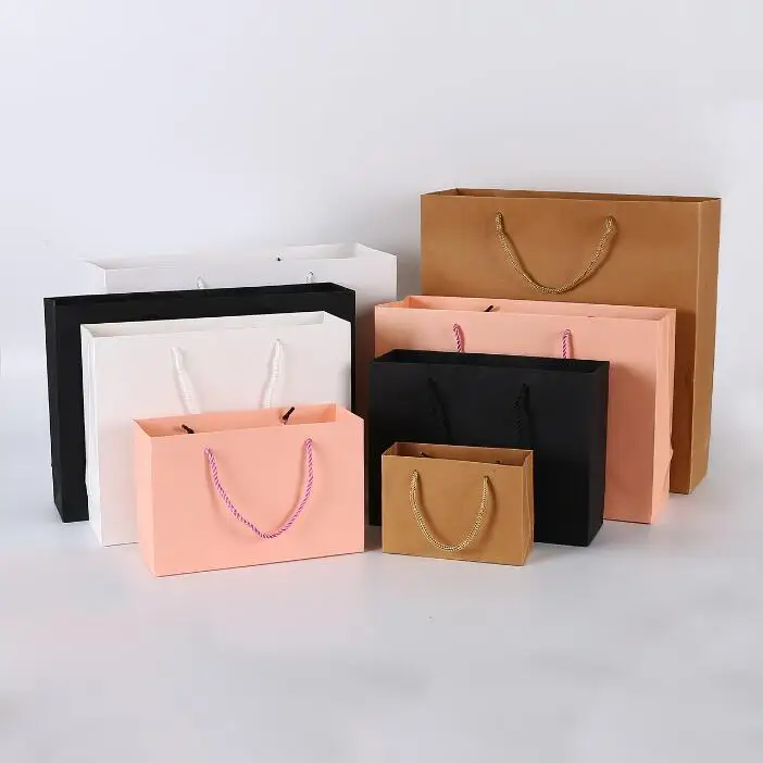 New Design Custom Personalized Printed LOGO White Cardboard Shopping Gift Black Paper Bag New Design