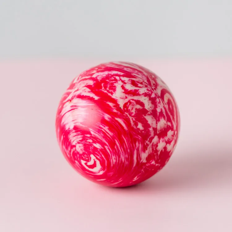 China manufacturer high quality red and white color 56mm bulk rubber bouncy ball