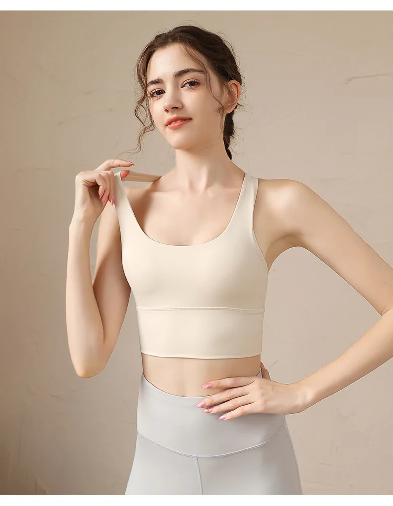 Wholesale women yoga 2023 strappy cross back sports bra 75% nylon and 25% spandex fitness gym top for girls Fitness yoga wear