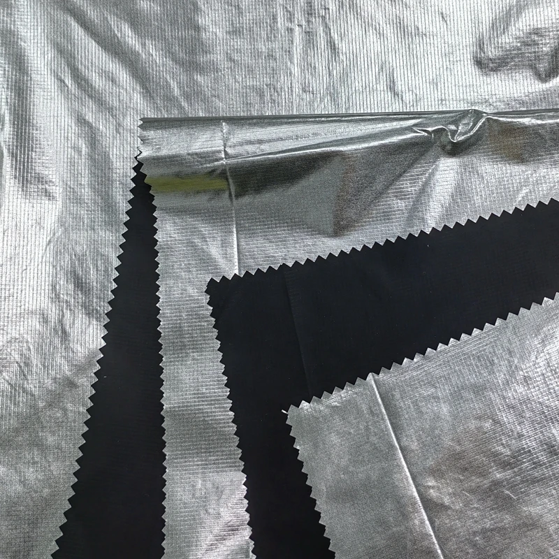 100% Polyamide 20D Silver Ripstop Nylon Fabric Aluminum Foil Print Coated For Jacket Lining