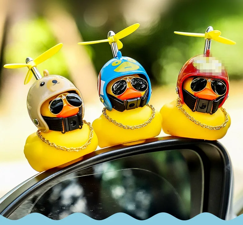 Cute Hot Selling Mini Yellow Rubber Duck with Helmet Car Duck for Car A toy that lights up and barks
