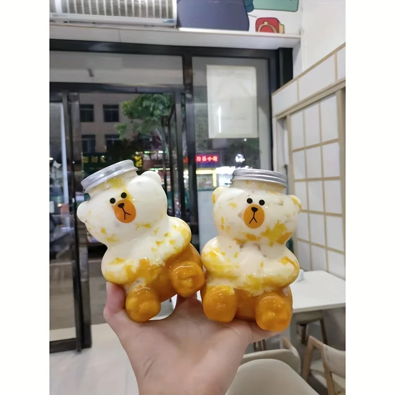 Factory Sell Pet Cartoon Juice Bottle Bear Shape Plastic Juice Bottle Beverage Bottle With Lid