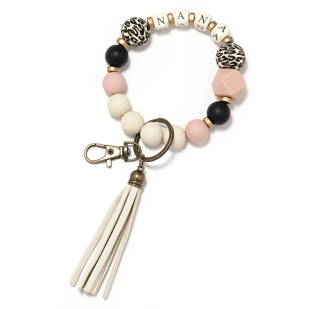 2022 Classic Popular Leather Tassel Wooden Bead Keychain Wholesale Bracelet Key Ring Silicone Bead Bracelet
